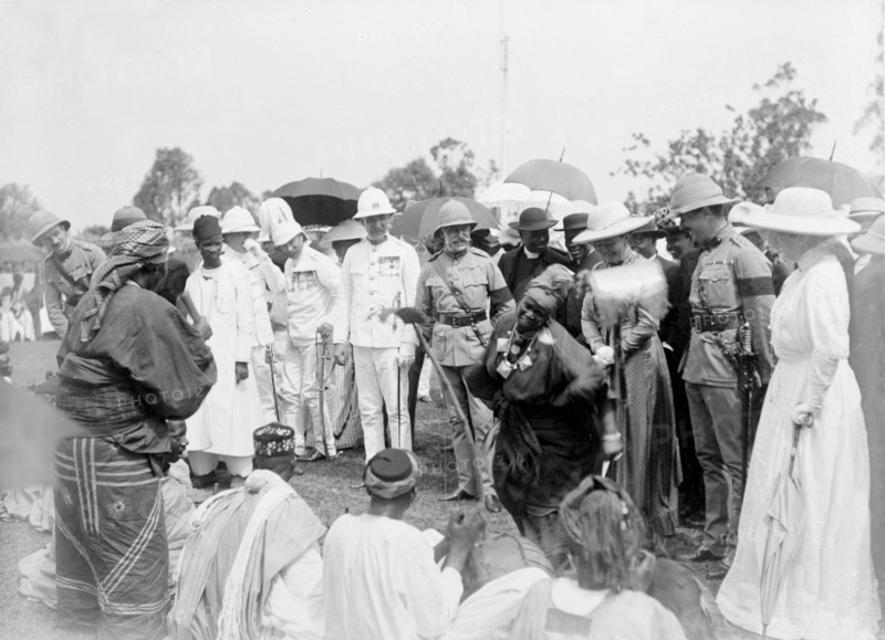 Duke of Connaught watches an African dance. An African woman performs a lively dance for the Duke and Duchess of Connaught at an outdoor reception by Bechuanaland chiefs. This was one of several stops made by the Duke following his official visit to Cape Town to open the new Union Parliament. Gaberones, Bechuanaland (Gaborone, Botswana), 24 November 1910. Gaborone, South East (Botswana), Botswana, Southern Africa, Africa.