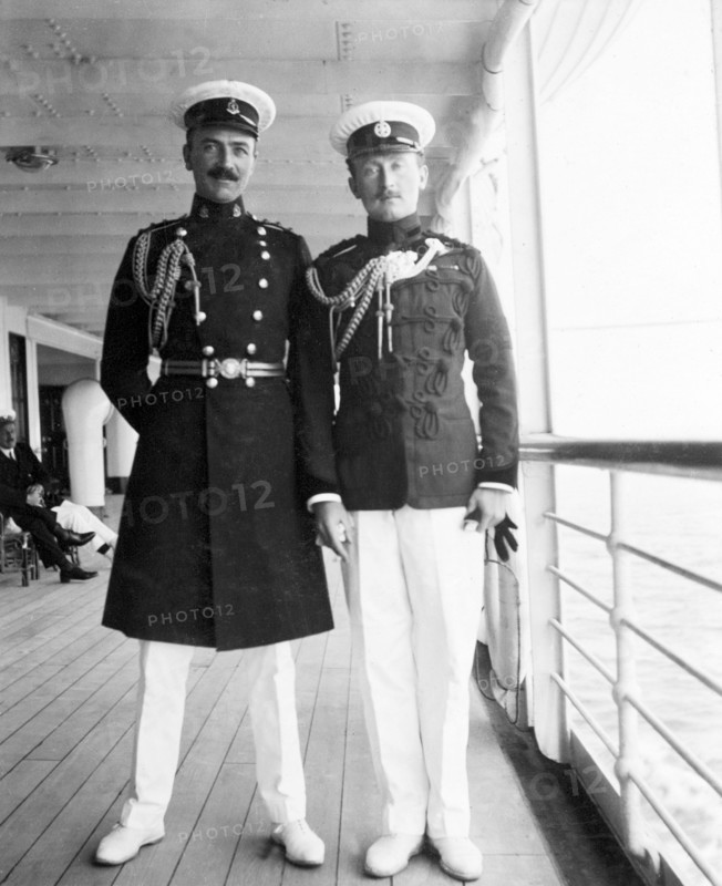 Officers aboard the S.S. Balmoral Castle. Two high-ranking British officers pose for the camera aboard the S.S. Balmoral Castle. The ship was transporting the Duke and Duchess of Connaught to England from South Africa, where they had recently opened the new Union Parliament in Cape Town. Probably Indian Ocean, Africa, circa 2 December 1910. Africa.