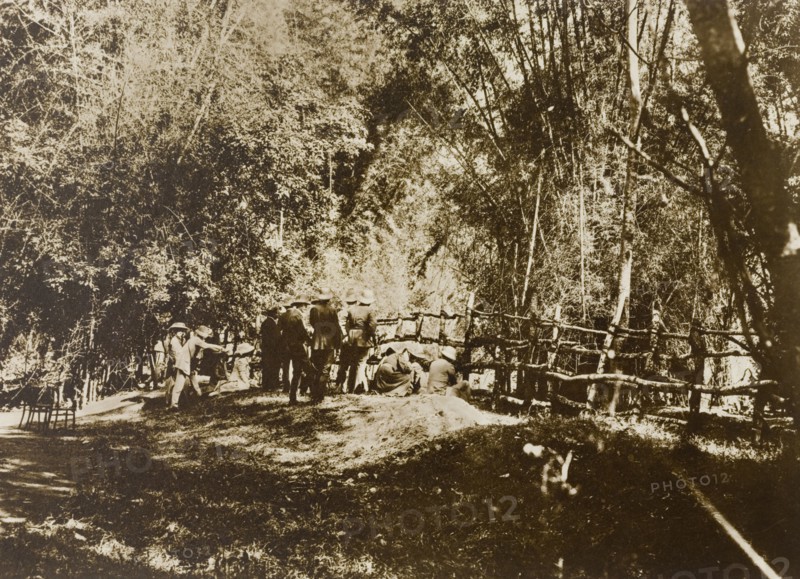 Progress of the drive. The Maharajah of Mysore (Krishna Raja Wadiyar IV, 1884-1940) and his hunting party watch the progress of an elephant drive from behind a stockade in the Kakankota Forests. Karnataka, India, 1909., Karnataka, India, Southern Asia, Asia.