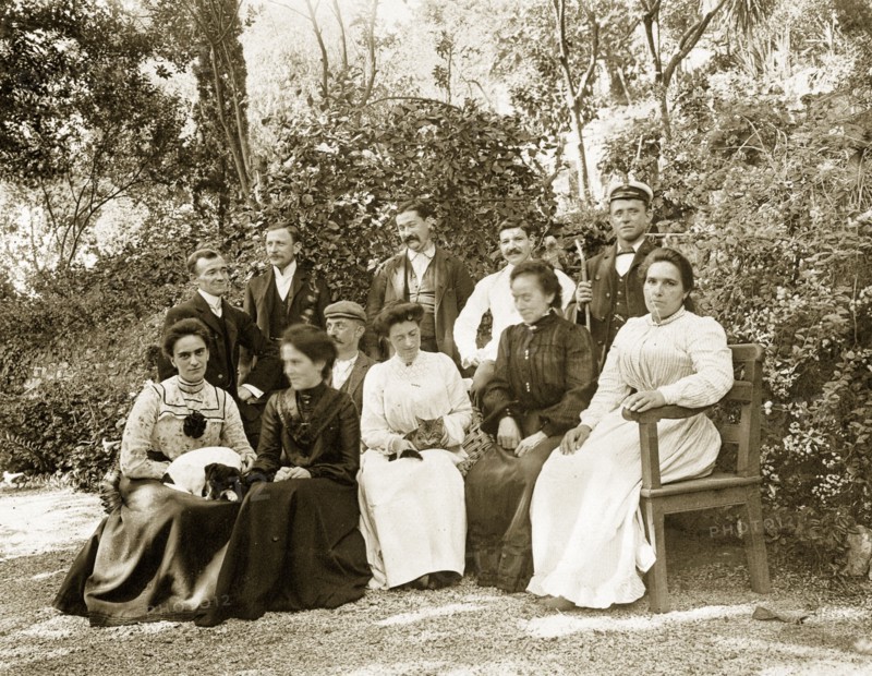 Group portrait in Gibraltar. Group portrait featuring several men and women seated outdoors in a garden. This is one of several photographs taken during a royal visit to Gibraltar by King Edward VII (1841-1910) and Kaiser Wilhelm II (1859-1941). The group featured are probably part of the royal entourage and may even be royal family members. Gibraltar, 1904., Gibraltar, Gibraltar, Mediterranean, Europe .