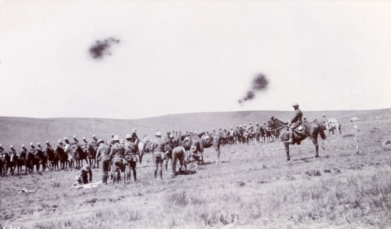 Fallen comrades during the Second Boer War. A mounted British cavalry unit prepares to remove its fallen comrades for burial, killed on one of the many battlefields of the Second Boer War (1899-1902). Probably Natal (KwaZulu Natal), South Africa, circa 1900., KwaZulu Natal, South Africa, Southern Africa, Africa.