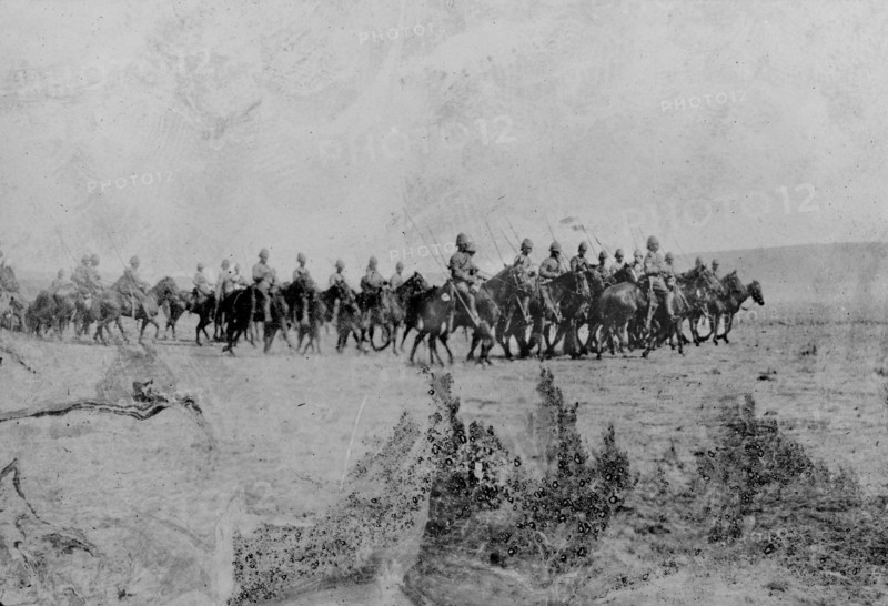 The Fifth Dragoon Guards in South Africa. The Fifth Dragoon Guards, a cavalry regiment of the British Army, ride across an open landscape during the Second Boer War (1899-1902). South Africa, circa 1900. South Africa, Southern Africa, Africa.