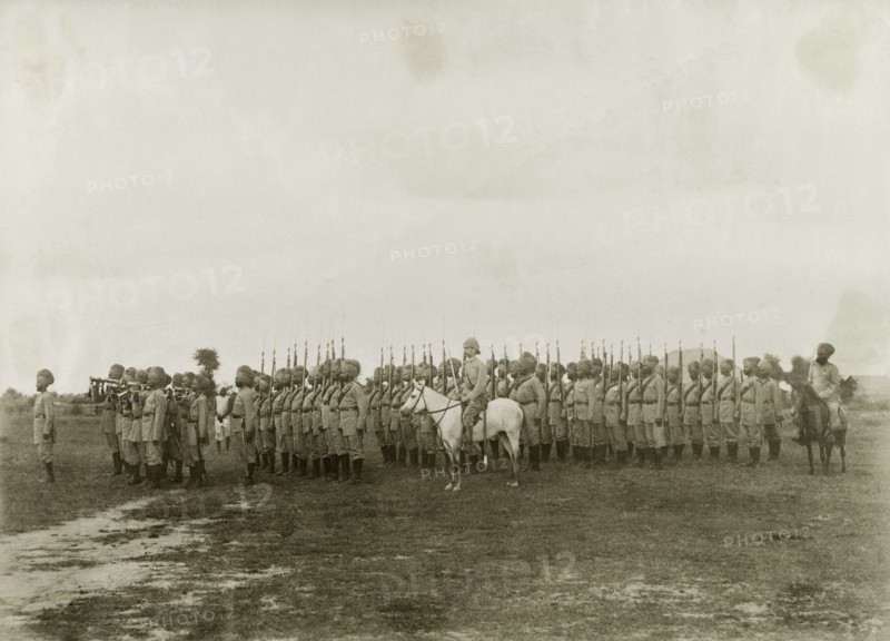 The Shwebo Battalion of Military Police. Indian officers from the Shwebo Battalion of Military Police stand to attention, their guns held upright. Led by Captain Keary, the company supported the British Army in a campaign to suppress Burmese rebels in Wuntho State (today known as the Sagaing Division). Sagaing, Burma (Myanmar), 1891., Sagaing, Burma (Myanmar), South East Asia, Asia.