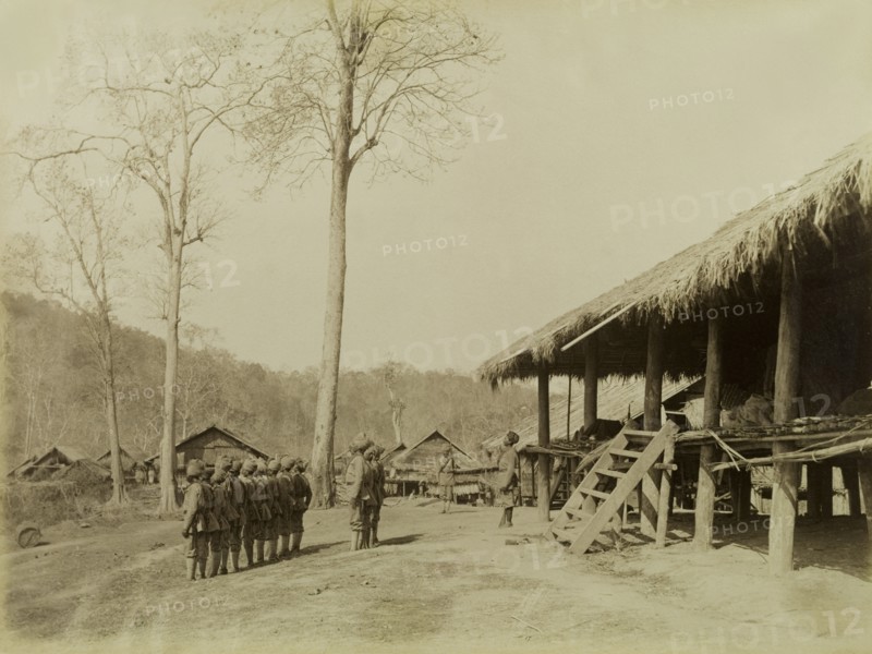 Guard house on the Morgandine Pass. Turbaned Indian soldiers stand outside a guard house, situated in a village on the Morgadine Pass. These men were part of forces supporting the British Army in a campaign to suppress Burmese rebels in Wuntho State (today known as the Sagaing Division). Sagaing, Burma (Myanmar), 1891., Sagaing, Burma (Myanmar), South East Asia, Asia.