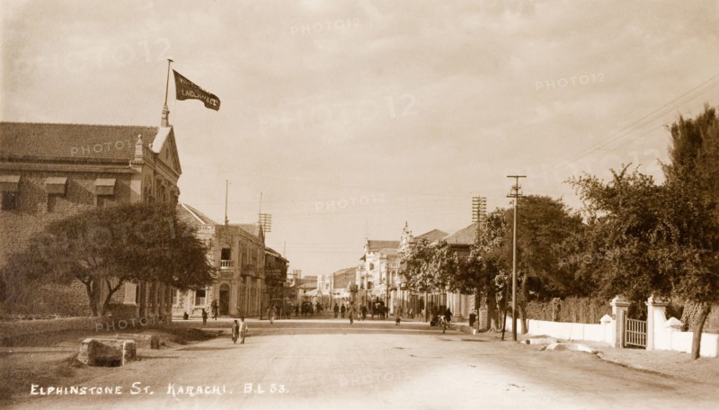 Elphinstone Street in Karachi. View down Elphinstone Street in Karachi. One of Karachi's oldest streets, it was named in honour of a British colonist and is lined with colonial-style buildings. It was renamed Zaibunnisa Street in 1970 by the Karachi Government in honour of Pakastani journalist, Zaib-un-Nissa Hamidullah. Karachi, India (Pakistan), circa 1910. Karachi, Sindh, Pakistan, Southern Asia, Asia.