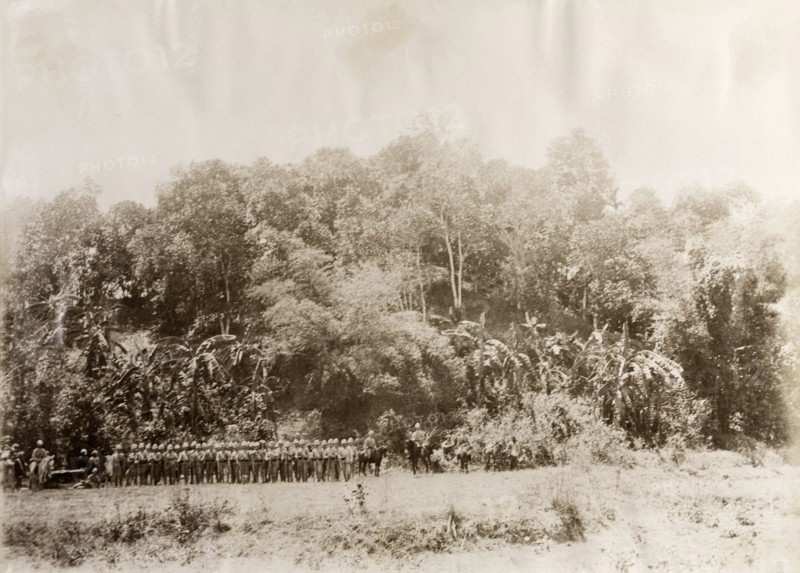 After the capture of Kyaing-Kwintaung. General Wolseley and soldiers of the Second Devonshire Regiment stand beneath the Kyaing-Kwintaung stockade following its capture. The stronghold was seized from the Saopha of Wuntho and his rebel supporters, who opposed British attempts to annex areas of Burma (Myanmar). Sagaing, Burma (Myanmar), 1891., Sagaing, Burma (Myanmar), South East Asia, Asia.
