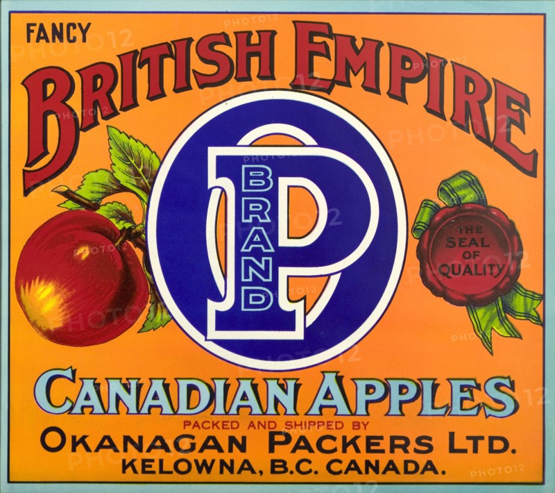 Advertisement for British Empire apples. A fruit box label advertises 'British Empire P Brand' Canadian apples from British Colombia, packed and shipped by Okanagan Packers Ltd., and distributed throughout North America and the United Kingdom. British Colombia, Canada, circa 1930., British Columbia, Canada, North America, North America .