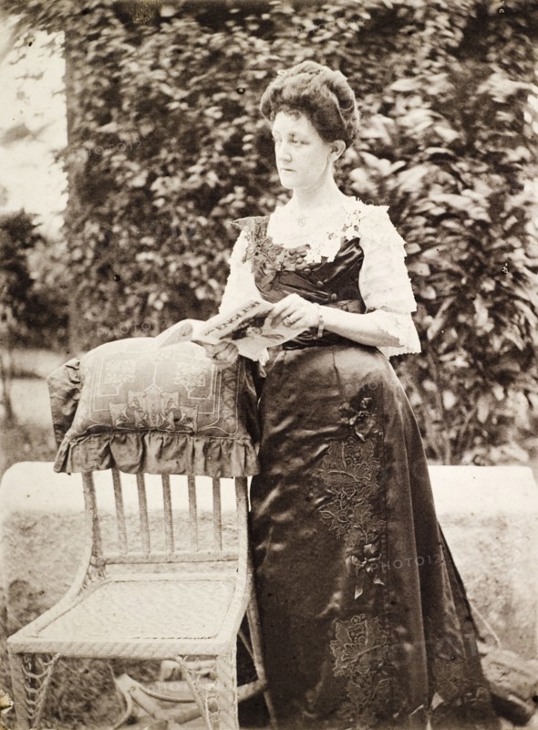 Portrait of Ellen Wood in mourning dress. Portrait of Ellen Anne Wood, the wife of Port Officer G.E. Wood. An original caption comments that her luxurious black satin dress was copied by an Indian durzi (tailor) from an English version supplied by Woodlands of Knightsbridge, London. The garment was made as a mourning dress to mark the death of King Edward VII. Port Blair, Andaman and Nicobar Islands, India, 1910. Port Blair, Andaman and Nicobar Islands, India, Southern Asia, Asia.