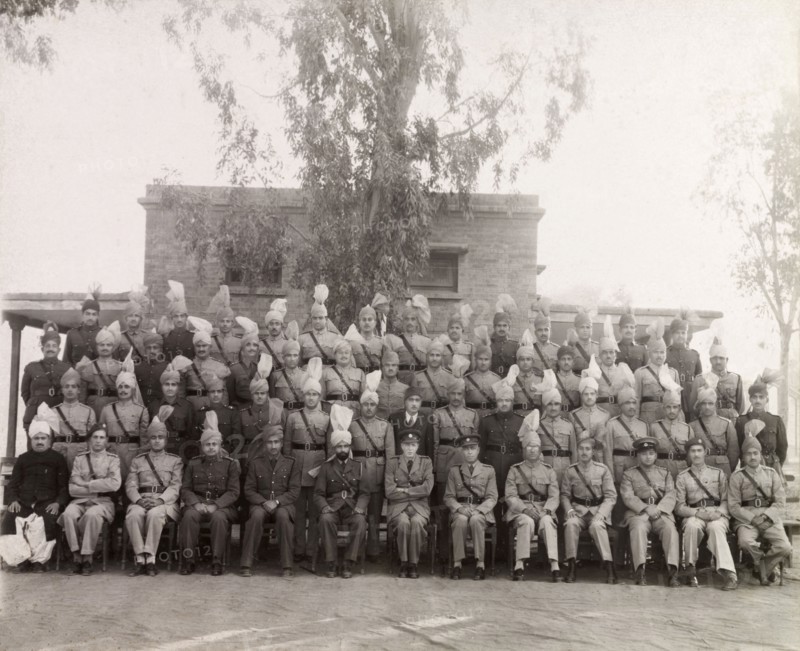 Rawalpindi District Police, 1947. Uniformed officers of the Rawalpindi District Police pose for a group portrait to commemorate the departure of the Superintendent of Police, Ray Mellor. Rawalpindi, Punjab, Pakistan, 5 December 1947. Rawalpindi, Punjab, Pakistan, Southern Asia, Asia.