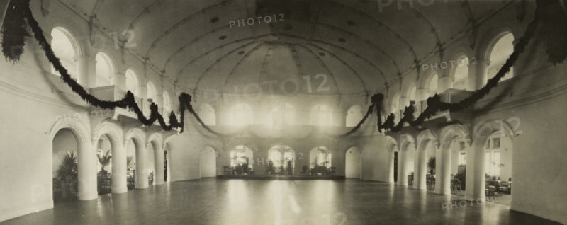The Government House ballroom, Perth. Panoramic view of the sumptuous ballroom inside Perth's Government House. The domed ceiling is echoed through a series of arched windows and doorways that surround an immaculate dance floor. Perth, Australia, 1901. Perth, West Australia, Australia, Australia, Oceania.