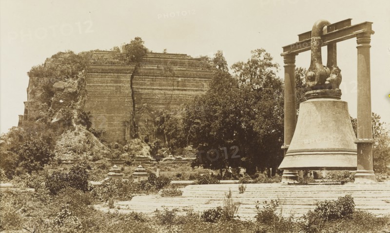 The bronze bell at Mingun Pagoda. The ruins of Mingun Pagoda and its huge bronze bell. The bell was cast by order of King Bodawpaya between 1809 and 1811, and is the largest ringing bell in the world. Burma (Myanmar), circa 1926. Mingun, Sagaing, Burma (Myanmar), South East Asia, Asia.