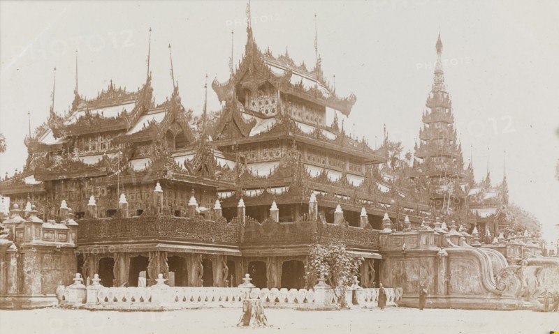 Shwenandaw Monastery in Mandalay. Exterior shot of the multi-tiered Shwenandaw Monastery, built by King Mindon at Mandalay Hill during the 19th century. Built in traditional Burmese style, the monastery is known for the intricate teak carvings of Buddhist myths that cover its parapets and balustrades. Mandalay, Burma (Myanmar), circa 1926. Mandalay, Mandalay, Burma (Myanmar), South East Asia, Asia.