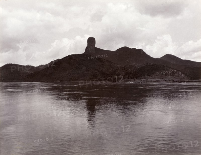 Monk's Head Rock' across the Xijiang River. View across the Xijiang River, featuring an unusual rock formation identified as 'Monk's Head Rock'. Near Hong Kong, China, circa 1903., Hong Kong, China, People's Republic of, Eastern Asia, Asia.