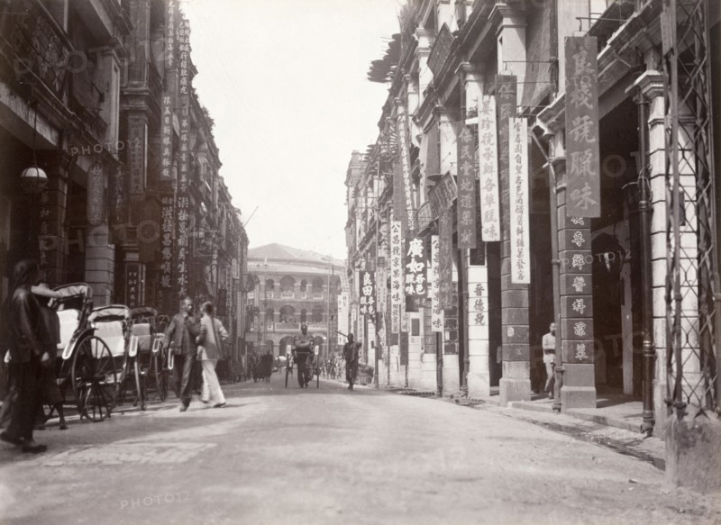 Queen's Road west, Hong Kong. Rickshaw drivers wait for passing business on Queen's Road west. Hong Kong, China, circa 1903. Hong Kong, Hong Kong, China, People's Republic of, Eastern Asia, Asia.