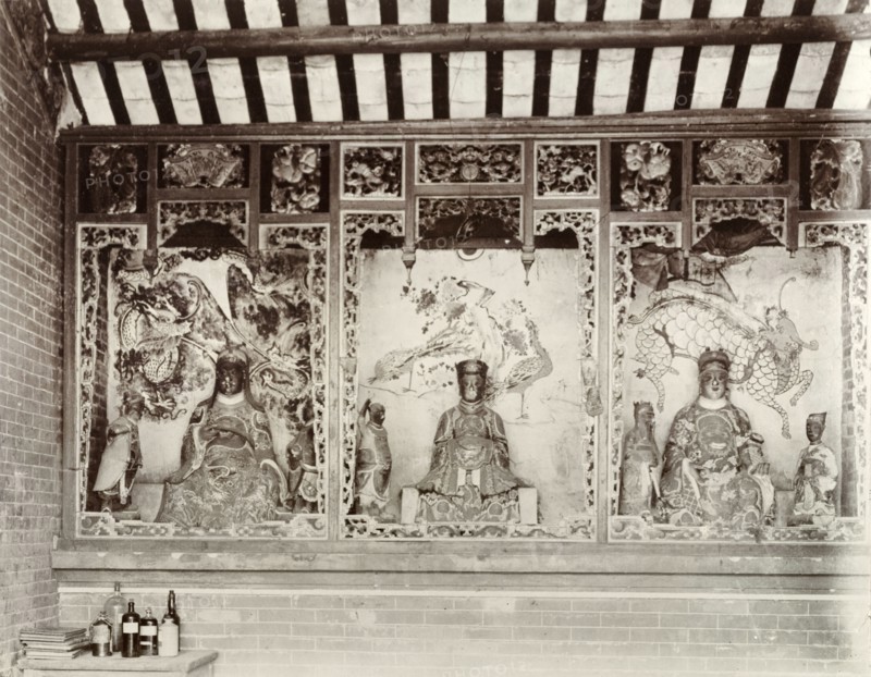 Deities inside a Chinese Joss house. Statues of Chinese deities ('Joss') line the walls inside a Joss house (Chinese temple). Santan Island, Zhejiang Province, China, circa 1905. Santan Island, Zhejiang, China, People's Republic of, Eastern Asia, Asia.