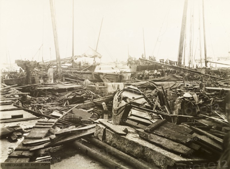 Typhoon devastation at East Point harbour. Devastation at East Point harbour, caused by a typhoon that killed an estimated 10,000 people. A mass of debris, including the wrecks of junks and sailboats, lies in a tangled heap on the harbourside. Hong Kong, China, circa 19 September 1906., Hong Kong, China, People's Republic of, Eastern Asia, Asia.