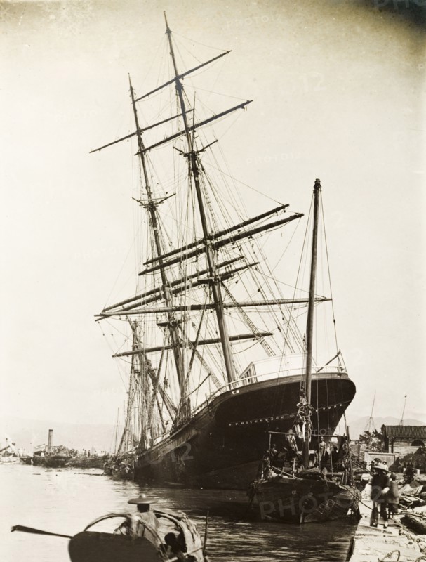 The 'Hitchcock' stricken by a typhoon. The 'Hitchcock', a large sailing ship, lies stricken on the 'praya' (waterfront promenade) at Hong Kong, in the aftermath of a devastating typhoon that killed an estimated 10,000 people. Hong Kong, China, circa 19 September 1906., Hong Kong, China, People's Republic of, Eastern Asia, Asia.