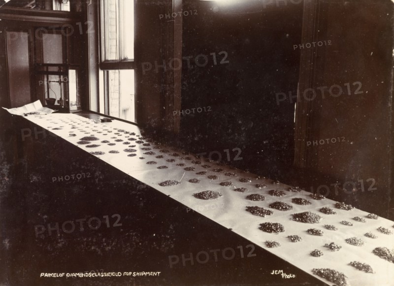 De Beers diamonds. Diamonds are sorted into parcels, ready for shipment, at the De Beers offices in Kimberley. Kimberley, South Africa, circa 1896. Kimberley, North Cape, South Africa, Southern Africa, Africa.