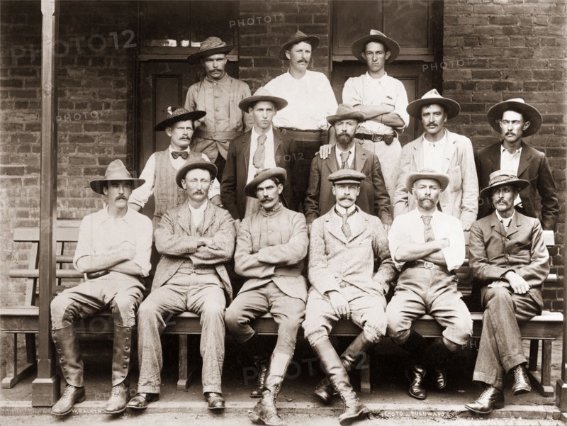 Native Commissioners of Matabeleland. Captain Arthur Lawley (1860-1932), Administrator of Matabeleland, poses for a group portrait with several Native Commissioners. Bulawayo, Rhodesia (Zimbabwe), circa 1898. Bulawayo, Matabeleland North, Zimbabwe, Southern Africa, Africa.