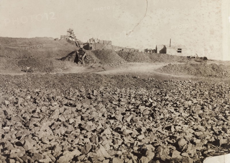 Blue ground' at De Beers diamond mines. View across 'blue ground' (nonoxidized kimberlite) looking towards mine workings at the De Beers diamond mine. Kimberley, South Africa, circa 1896. Kimberley, North Cape, South Africa, Southern Africa, Africa.