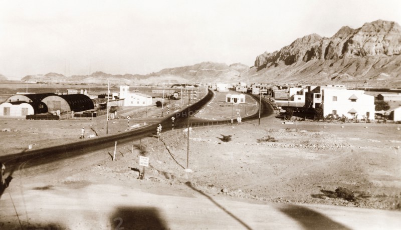 Road leading to a crater, Aden. A main road leads away into the distance, towards the crater of an extinct volcano. Aden, Yemen, 1943. Aden, Adan, Yemen, Middle East, Asia.