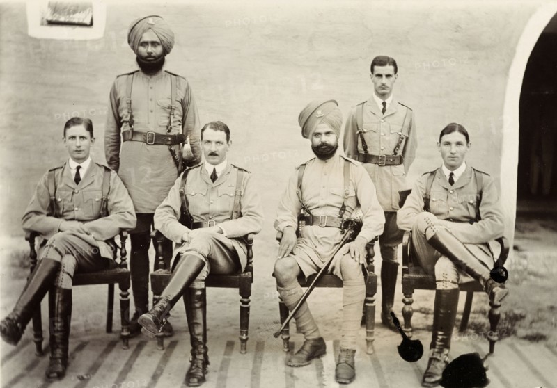 Six British and Indian VCOs. Six VCOs (Viceroy's Commissioned Officers) of the Indian Army pose for a group portrait dressed in military uniform. Multan, Punjab, India (Pakistan), 1916. Multan, Punjab, Pakistan, Southern Asia, Asia.