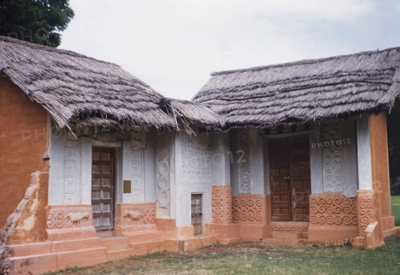 Reconstruction of a fetish priest's house. A life-size reconstruction of a fetish priest's house at Accra Museum. Accra, Ghana, circa 1960. Accra, East (Ghana), Ghana, Western Africa, Africa.