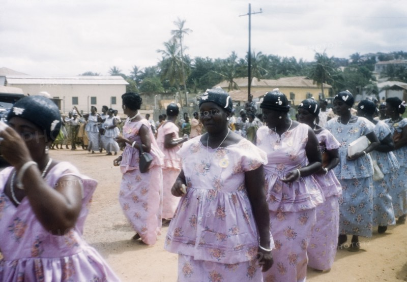 Women dancing in Easter parade. Ghanaian women dance in procession during an Easter parade. Saltpond, Ghana, circa 1960. Saltpond, West (Ghana), Ghana, Western Africa, Africa.