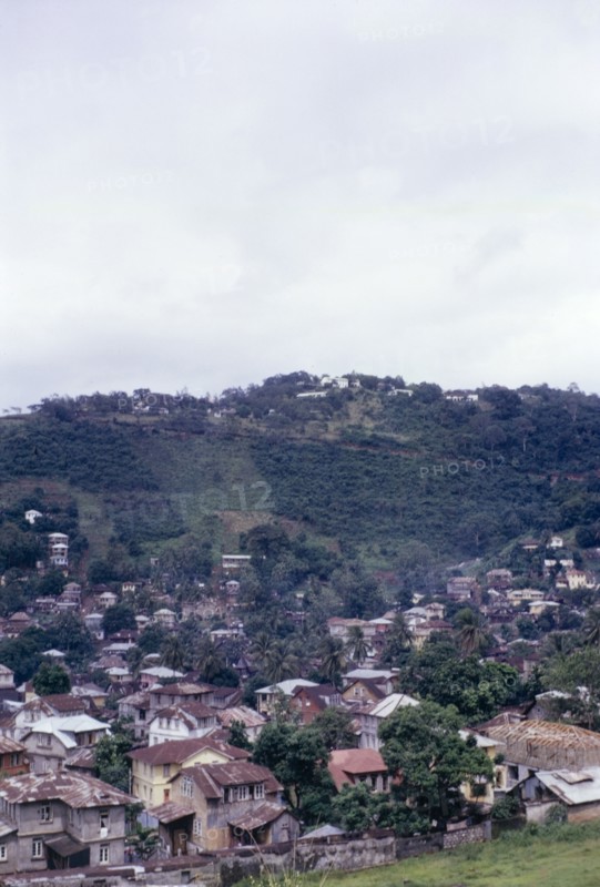 Fourah Bay. View over Fourah Bay, nestled in the foothills of a mountain. Freetown, Sierra Leone, circa 1960. Freetown, West (Sierra Leone), Sierra Leone, Western Africa, Africa.