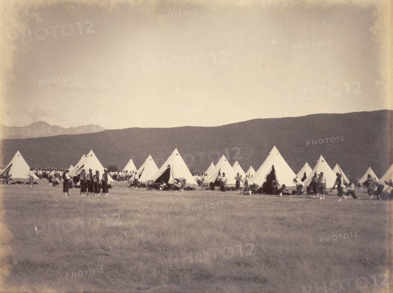 Second West India Regiment under canvas. Bell tents belonging to the Second West India Regiment are pitched at a military camp in a mountain valley. Formed by the British as a colonial infantry regiment, the troops comprised freed slaves from North America and purchased slaves from the West Indies. Jamaica, circa 1891. Jamaica, Caribbean, North America .