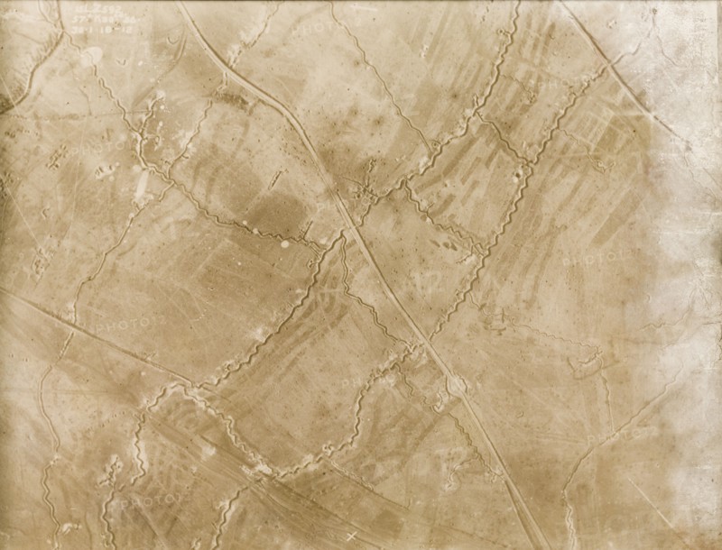 A trench system on the Western Front. One of a series of British aerial reconnaissance photographs recording the positions of trenches on the Western Front during the First World War. An intricate trench system zig-zags its way across the fields. An original caption identifies a front line, probably British, intersected by support, reserve and communication trenches, and points out the positions of gun posts and dugouts. Nord-Pas de Calais or Picardie, France, 30 January 1918., Nord-Pas de Calais, France, Western Europe, Europe .