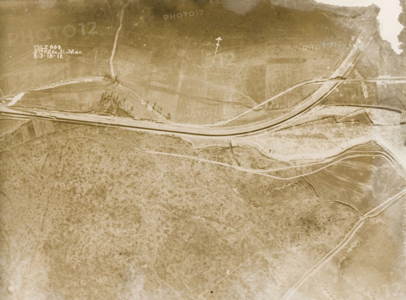 A railway track on the Western Front. One of a series of British aerial reconnaissance photographs recording the positions of trenches on the Western Front during the First World War. Trenches zig-zag their way across fields, intersected by a prominent line, probably a railway track, which runs from west to north. Nord-Pas de Calais or Picardie, France, 8 March 1918., Nord-Pas de Calais, France, Western Europe, Europe .