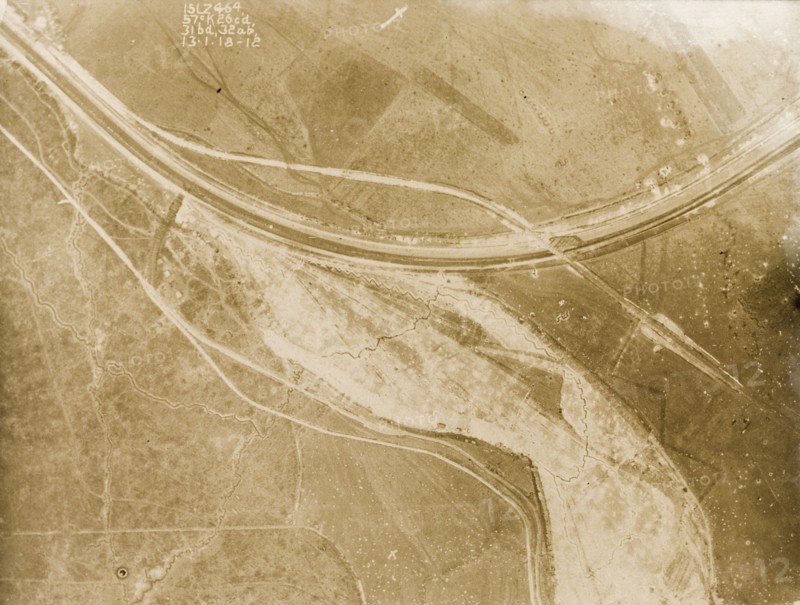A railway track on the Western Front. One of a series of British aerial reconnaissance photographs recording the positions of trenches on the Western Front during the First World War. Trenches zig-zag their way across fields, intersected by a prominent line, probably a railway track, which runs from west to north. Nord-Pas de Calais or Picardie, France, 15 March 1918., Nord-Pas de Calais, France, Western Europe, Europe .