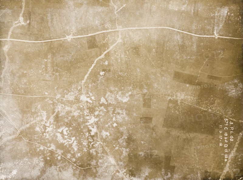A mined road on the Western Front. One of a series of British aerial reconnaissance photographs recording the positions of trenches on the Western Front during the First World War. Two white circles on the main road indicate the explosion points of mines. Nord-Pas de Calais or Picardie, France, 11 September 1917., Nord-Pas de Calais, France, Western Europe, Europe .