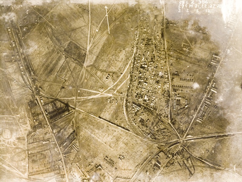 Military camp in a ruined village. One of a series of British aerial reconnaissance photographs recording the positions of trenches on the Western Front during the First World War. A military camp, probably British, based in the ruins of a bomb-damaged village. Nord-Pas de Calais or Picardie, France, 2 February 1918., Nord-Pas de Calais, France, Western Europe, Europe .