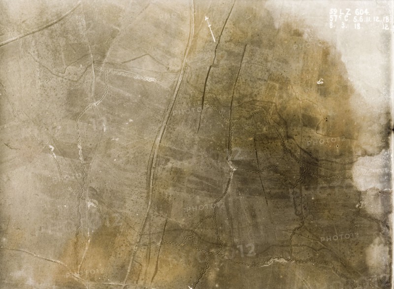 Aerial view of a trench system on the Western Front. One of a series of British aerial reconnaissance photographs recording the positions of trenches on the Western Front during the First World War. An intricate system of square-toothed trenches cut across fields pockmarked with bomb craters. Nord-Pas de Calais or Picardie, France, 8 March 1918., Nord-Pas de Calais, France, Western Europe, Europe .