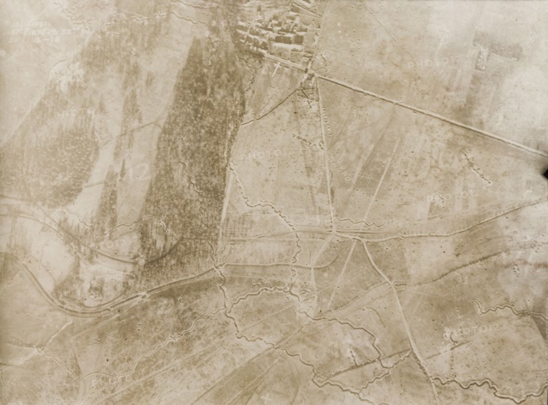 Aerial view of a trench system on the Western Front. One of a series of British aerial reconnaissance photographs recording the positions of trenches on the Western Front during the First World War. An intricate trench system zig-zags its way across snow-covered fields on the outskirts of a bomb-damaged village. Nord-Pas de Calais or Picardie, France, 30 January 1918., Nord-Pas de Calais, France, Western Europe, Europe .