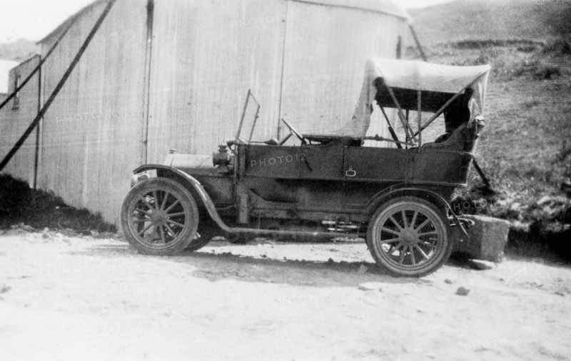 The Lawrence family's touring car. A Ford Model T touring car belonging to the Lawrence family is pictured on a seaside road during a family holiday to Jersey. Sir Henry Staveley Lawrence was a British civil servant in India and was serving as Acting Governor of Bombay at the time of this photograph. St Ouen's Bay, Jersey, January 1926. St Ouen's Bay, Jersey, Channel Islands, Western Europe, Europe .