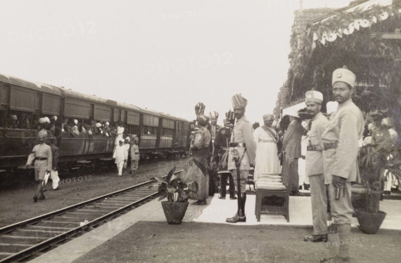 Awaiting the Acting Governor of Bombay. The Maharajah of Kolhapur, Rajaram II Bonsle (r.1922-40), and other Indian dignitaries await the arrival of Sir Henry Staveley Lawrence, Acting Governor of Bombay, on the platform at Kolhapur railway station. Kolhapur, Kolhapur State (Maharashtra), India, 14 October 1925. Kolhapur, Maharashtra, India, Southern Asia, Asia.