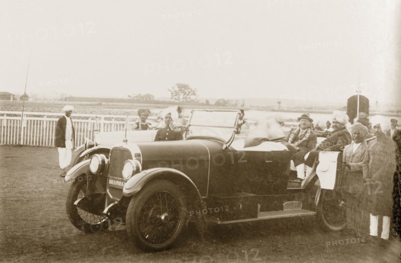 Maharajah of Kolhapur with the Acting Governor of Bombay. Sir Henry Staveley Lawrence, Acting Governor of Bombay, sits inside an open-topped car with the Maharajah of Kolhapur, Rajaram II Bonsle (r.1922-40), during his official visit to Kolhapur. Kolhapur, Kolhapur State (Maharashtra), India, 14 October 1925. Kolhapur, Maharashtra, India, Southern Asia, Asia.