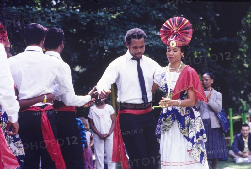 Dancers at the Caribbean Music Village. Male and female dancers perform at the Caribbean Music Village, a cultural festival held at the Commonwealth Institute. London, England, 7-26 July 1986. London, London, City of, England (United Kingdom), Western Europe, Europe .