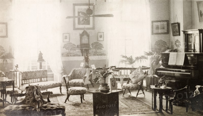 Drawing room of 12 Government Place, Calcutta. The newly-refurbished, elegant drawing room of the flat above the family-owned chronometers 'James Murray and Co.', located at 12 Government Place. Calcutta (Kolkata), India, circa 1910. Kolkata, West Bengal, India, Southern Asia, Asia.