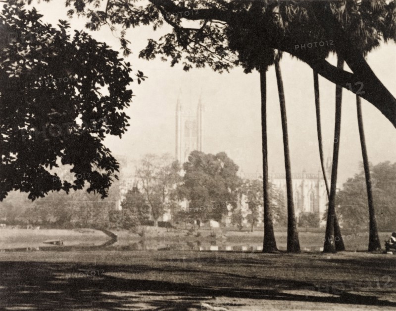 St. Paul's Cathedral, Calcutta. View over an open landscape to St. Paul's Cathedral in Calcutta, shortly after an earthquake demolished the cathedral's spire. Calcutta (Kolkata), India, circa 1934. Kolkata, West Bengal, India, Southern Asia, Asia.