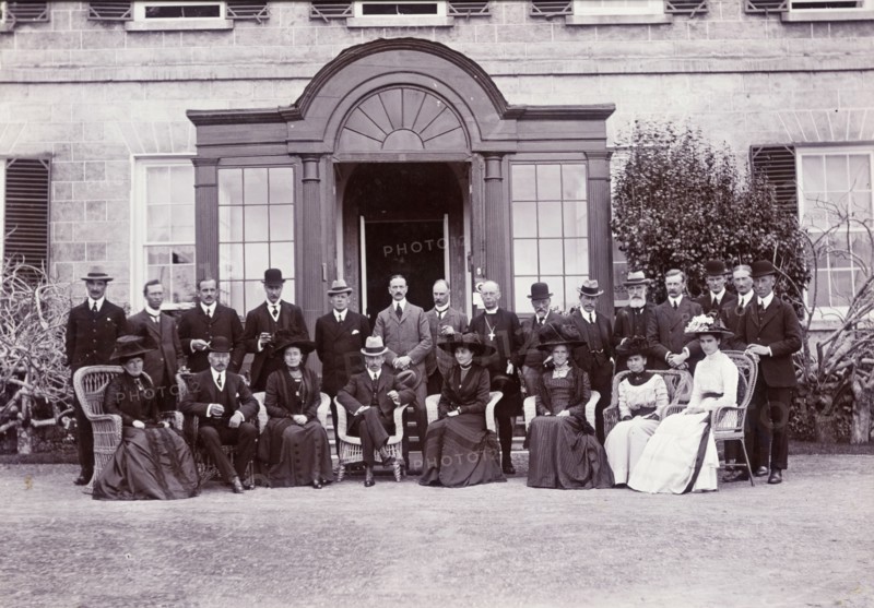 Duke of Connaught in St Helena. The Duke and Duchess of Connaught assemble for a photograph with European dignitaries outside Government House. This was one of several stops made by the royal couple on their way to Cape Town to open the new Union Parliament. St Helena, 25 October 1910. St Helena, Atlantic Ocean, Africa.