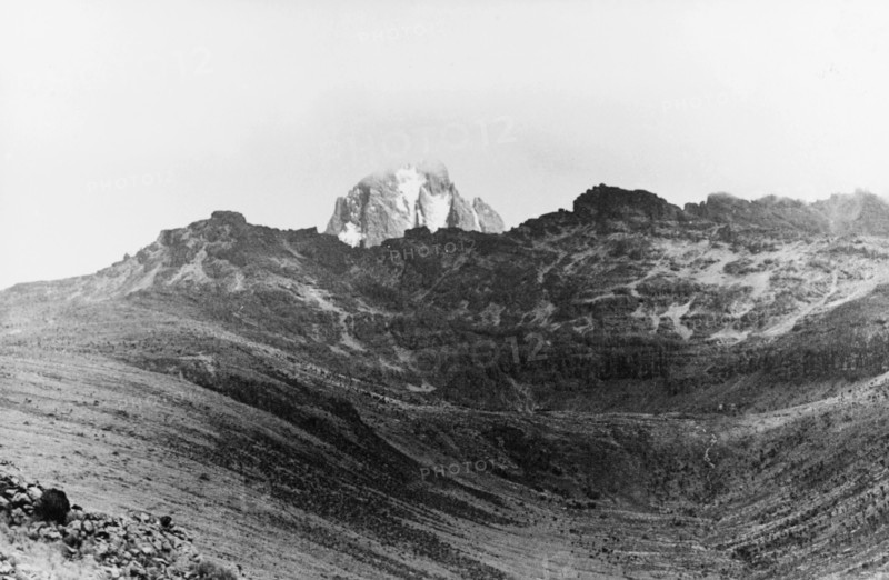 Mount Kenya, 1936. The summit of Mount Kenya is partially obscured by cloud. Kenya, circa 1936. Kenya, Eastern Africa, Africa.