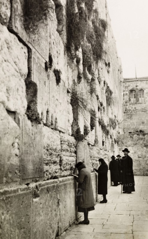 The Wailing Wall, Jerusalem. Jewish people pray at the Wailing Wall (Western Wall or The Kotel) in Jerusalem. Jerusalem, British Mandate of Palestine (Israel), circa 1942. Jerusalem, Jerusalem, Israel, Middle East, Asia.