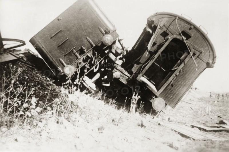 Derailed carriages at Ras el Ain. Two railway carriages lie upturned on a railway embankment, derailed in a sabotage attack by Palestinian Arab dissidents during the Great Uprising (1936-39). Ras el Ain, British Mandate of Palestine (Israel), circa 1938. Israel, Middle East, Asia.