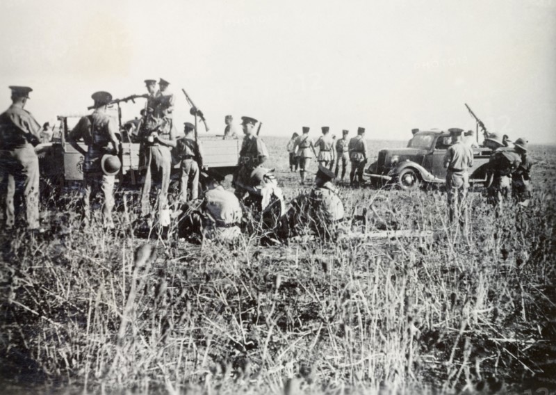Scene of a railway incident, Lydda. British police and soldiers of the Royal Engineers gather at the scene of a railway crash, an act of sabotage committed by Palestinian Arab dissidents during the Great Uprising (1936-39). Lydda, British Mandate of Palestine (Lod, Israel), circa 1938. Lod, Central (Israel), Israel, Middle East, Asia.