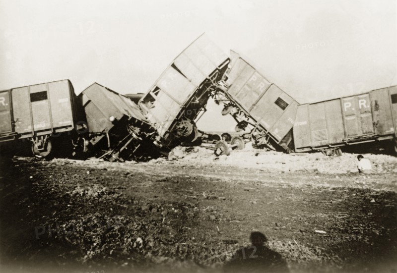 Derailed freight cars at Lydda. Several freight cars lie in a tangled heap, derailed in a sabotage attack by Palestinian Arab dissidents during the Great Uprising (1936-39). Lydda, British Mandate of Palestine (Lod, Israel), circa 1938. Lod, Central (Israel), Israel, Middle East, Asia.