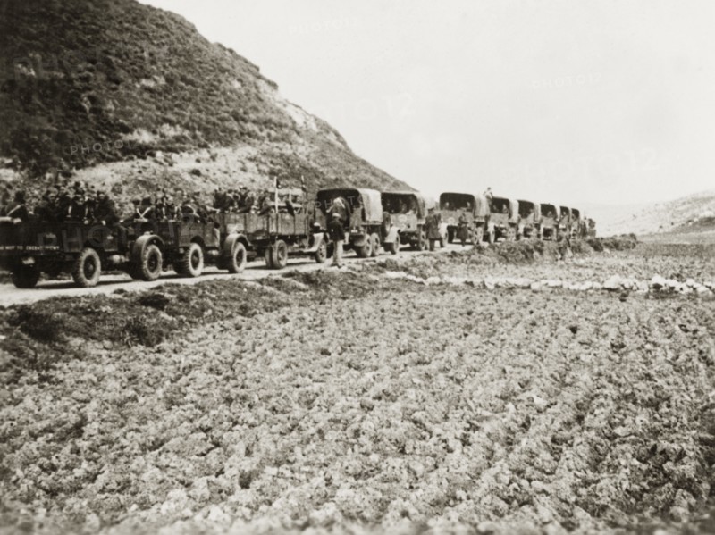British military trucks in Palestine. A column of military trucks transport British soldiers through the Palestinian countryside. During the period of the Great Uprising (1936-39), an additional 20,000 British troops were deployed to Palestine in an attempt to clamp down on Arab dissidence. British Mandate of Palestine (Middle East), circa 1938., Middle East, Asia.